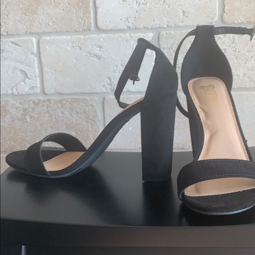 Black suede high heels